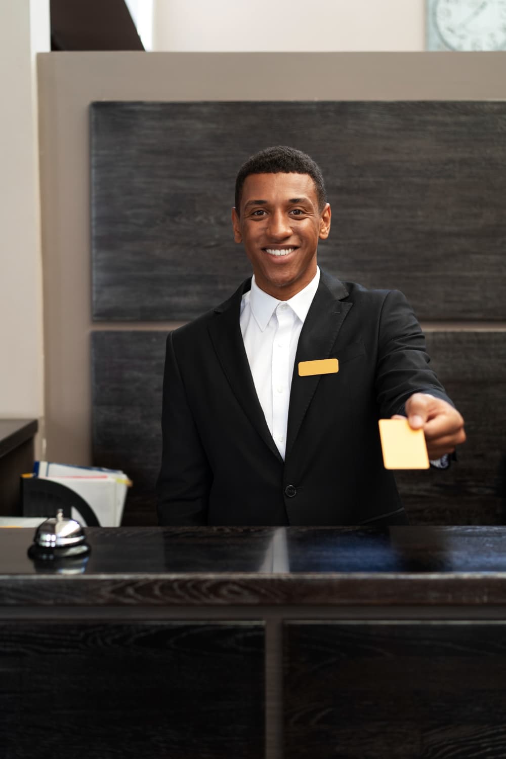 Hotel team managing guest check-in and service operations